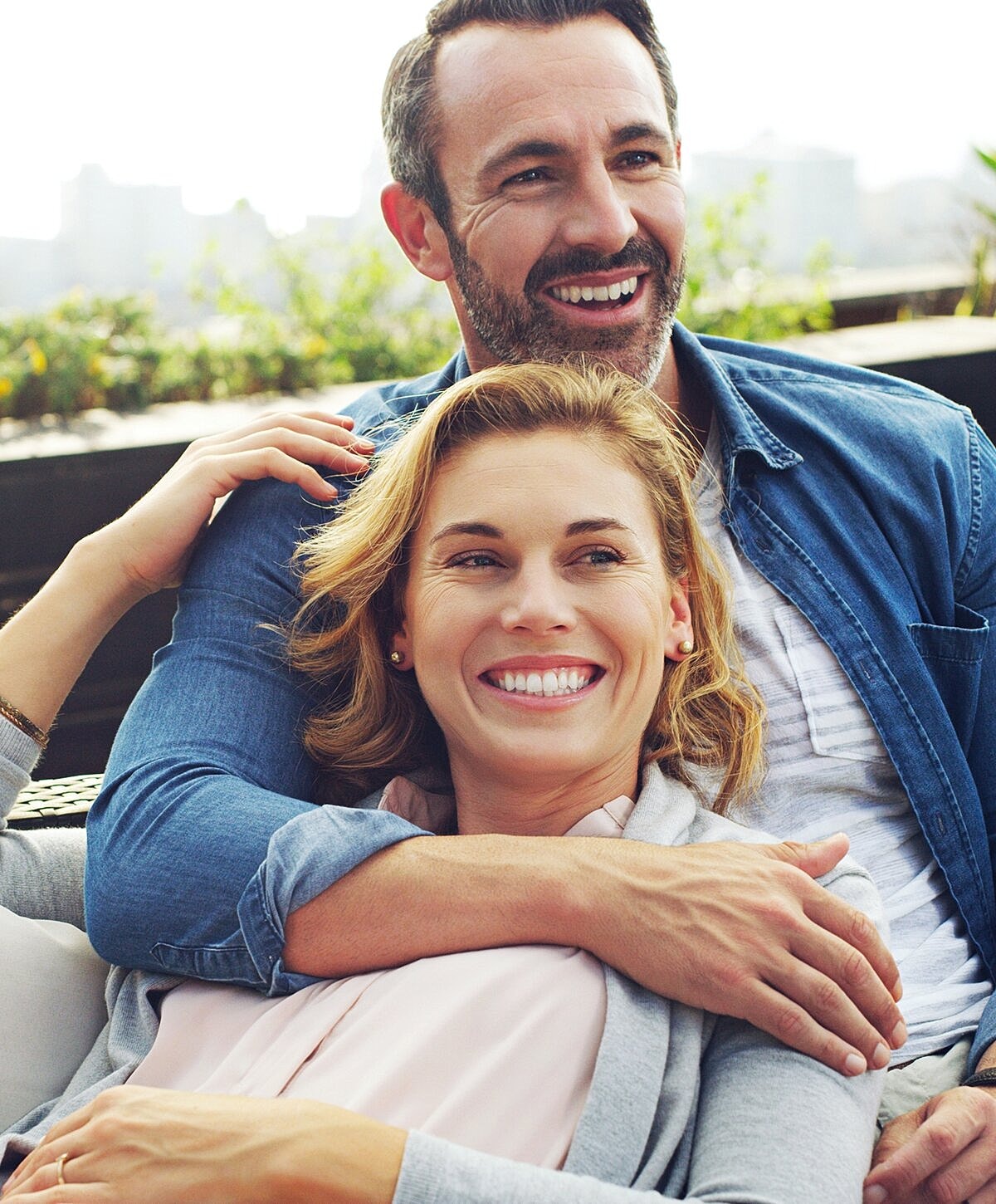Smiling doctor in a dental office setting.
