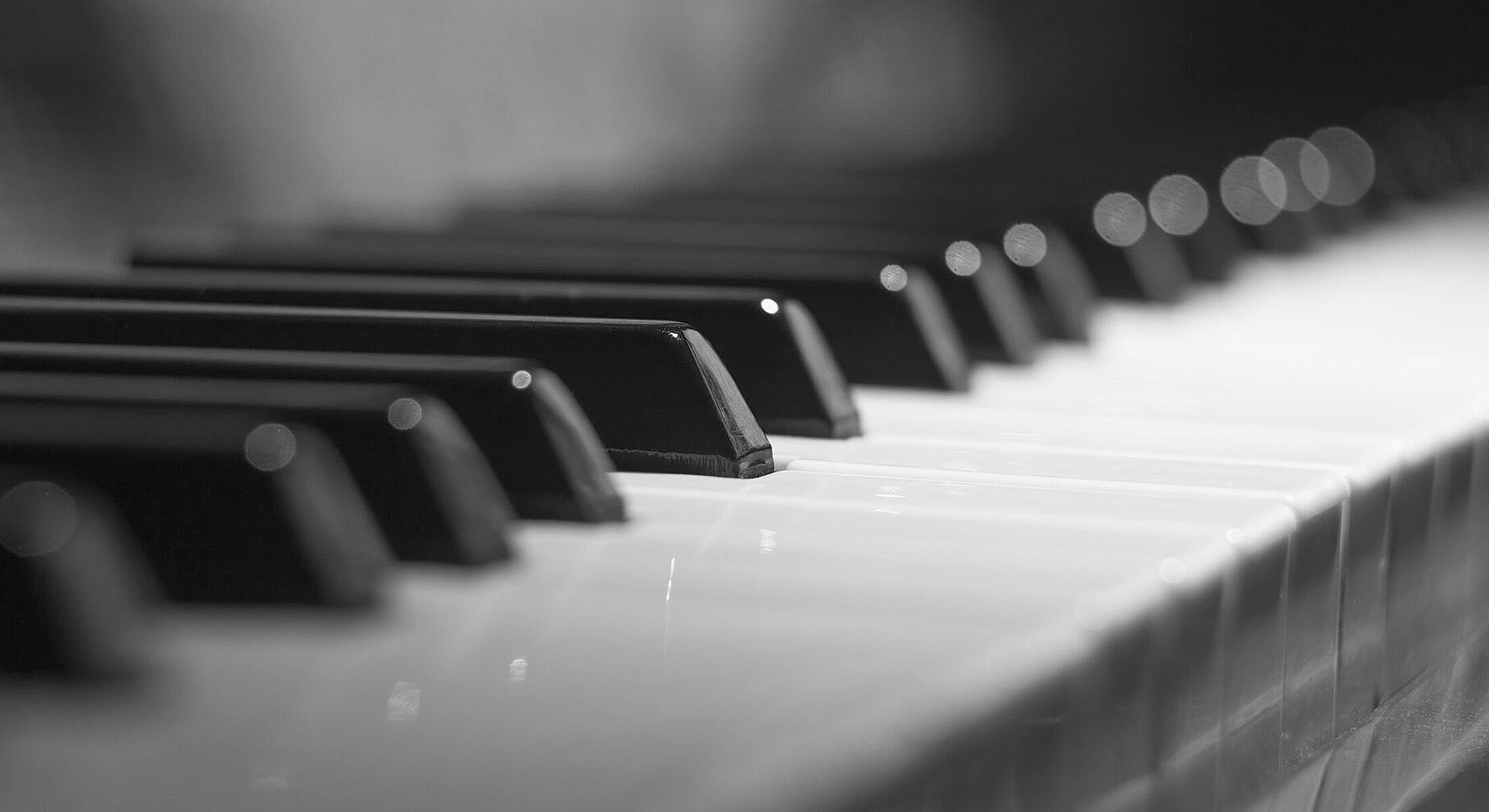 Close-up of black and white piano keys.