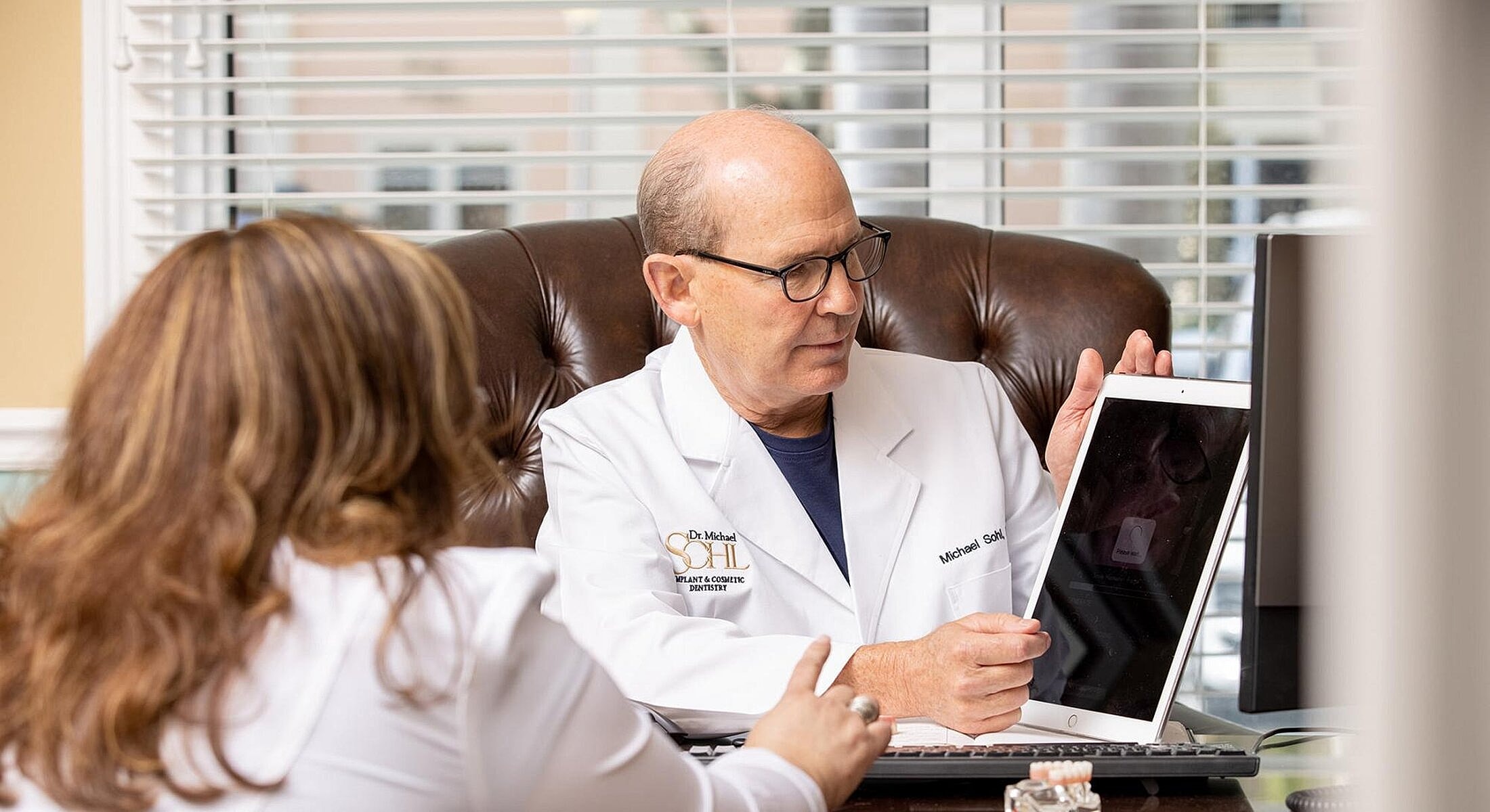 Doctor discussing treatment with a patient.
